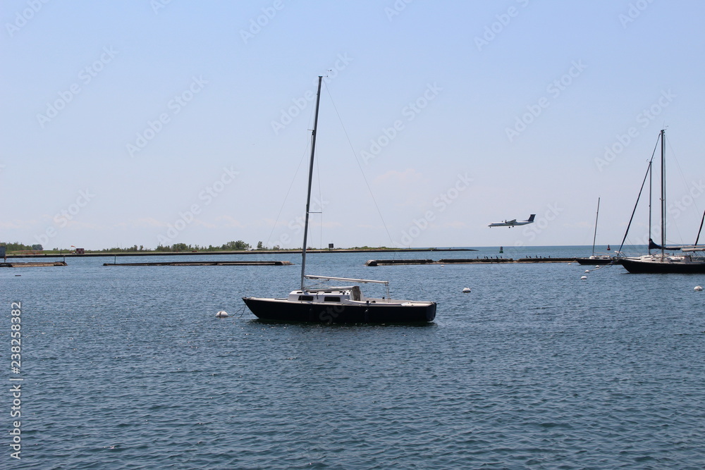 Boat and Plane on the water