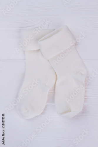 Pair of white warm wool toddler socks.