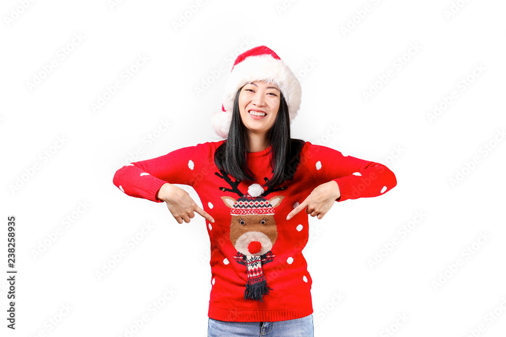 Beautiful smiling asian woman wearing knitted sweater celebrating Christmas. Attractive brunette casual female, new years eve. Ugly Christmas sweater concept. Background, copy space, close up portrait