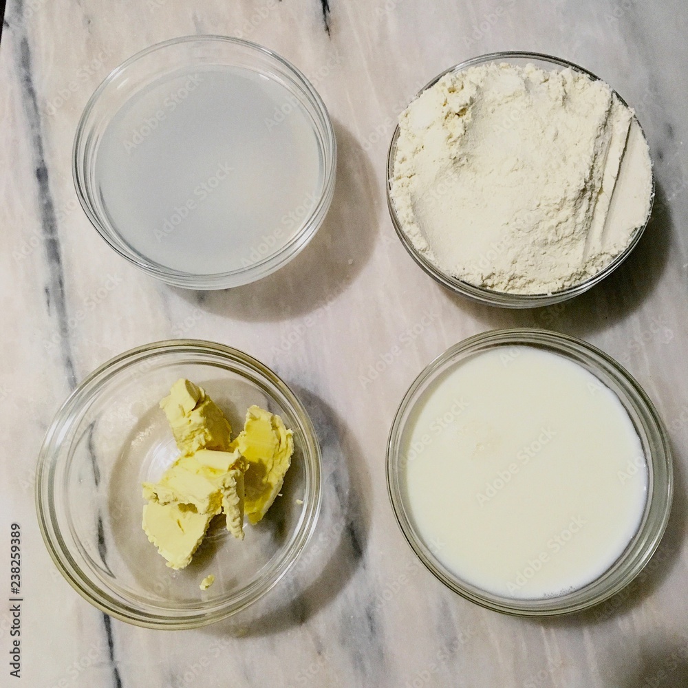 bowls with ingredients to make pancakes