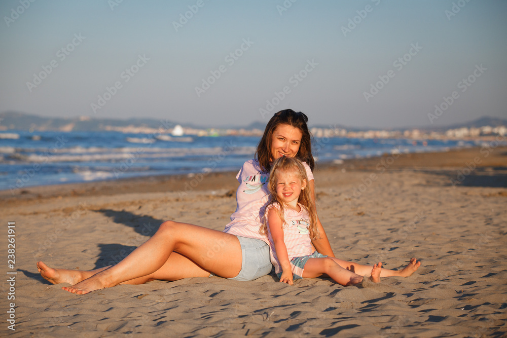 Fototapeta premium Mother with daughter in Rimini