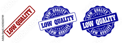 LOW QUALITY grunge stamp seals in red and blue colors. Vector LOW QUALITY labels with dirty style. Graphic elements are rounded rectangles, rosettes, circles and text labels.