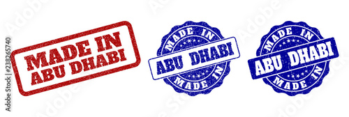 MADE IN ABU DHABI grunge stamp seals in red and blue colors. Vector MADE IN ABU DHABI signs with draft effect. Graphic elements are rounded rectangles, rosettes, circles and text captions.