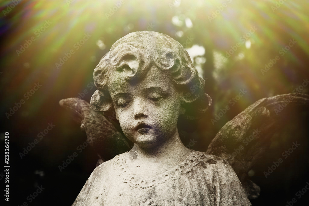 Ancient statue of sad angel of death as symbol of the end of life. Ancient statue of sad angel of death as symbol of the end of life.