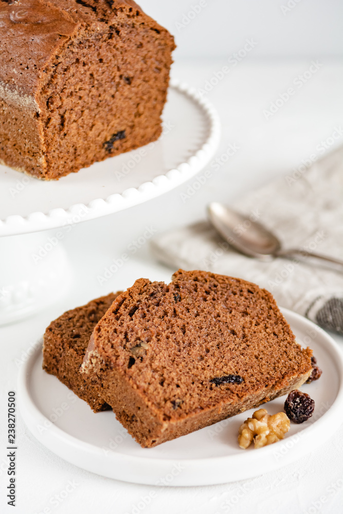 Homemade gingerbread cake on white plate. Honey cake. Homemade gingerbread cake on white plate. Honey cake.