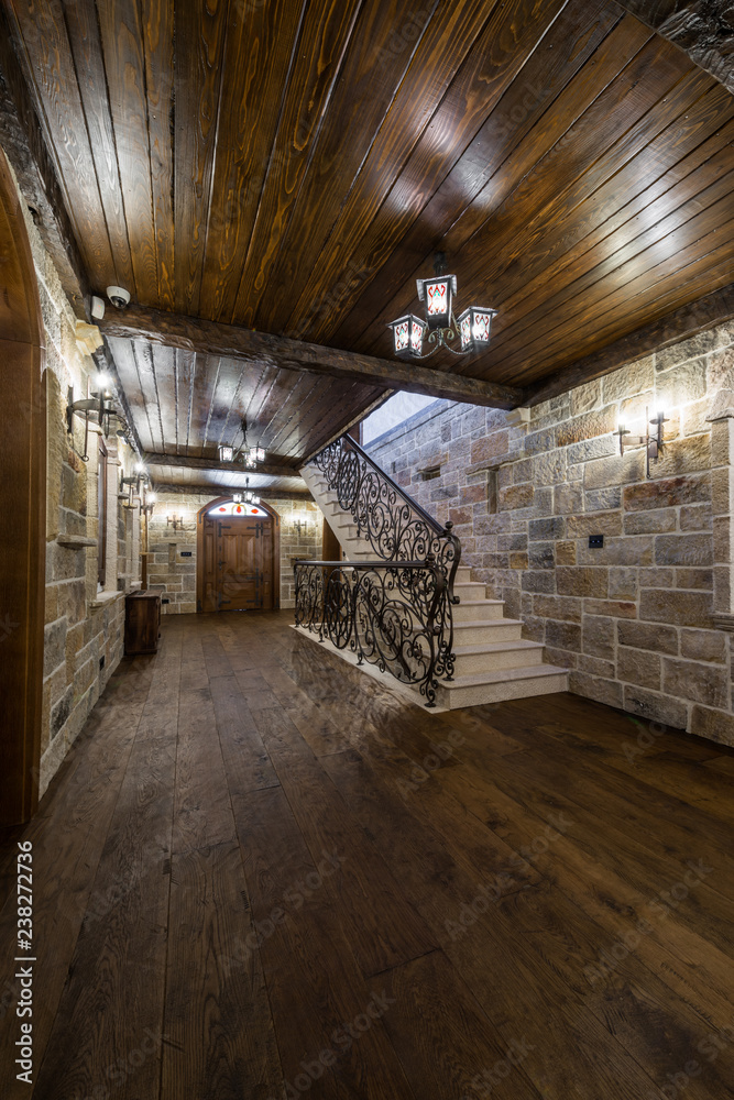 Ceiling and wooden floor with staircases in luxury mansion