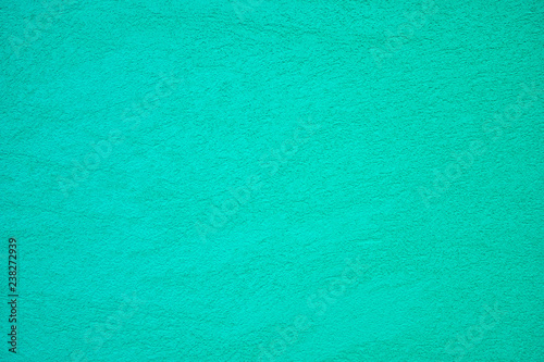Tableau sur toile The texture of plastered tiffany blue or turcuoise wall, background