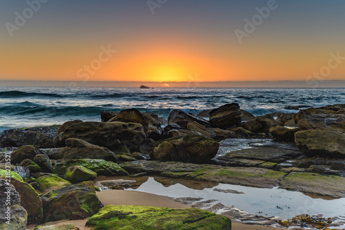 A Killcare Sunrise Seascape with Boat photo