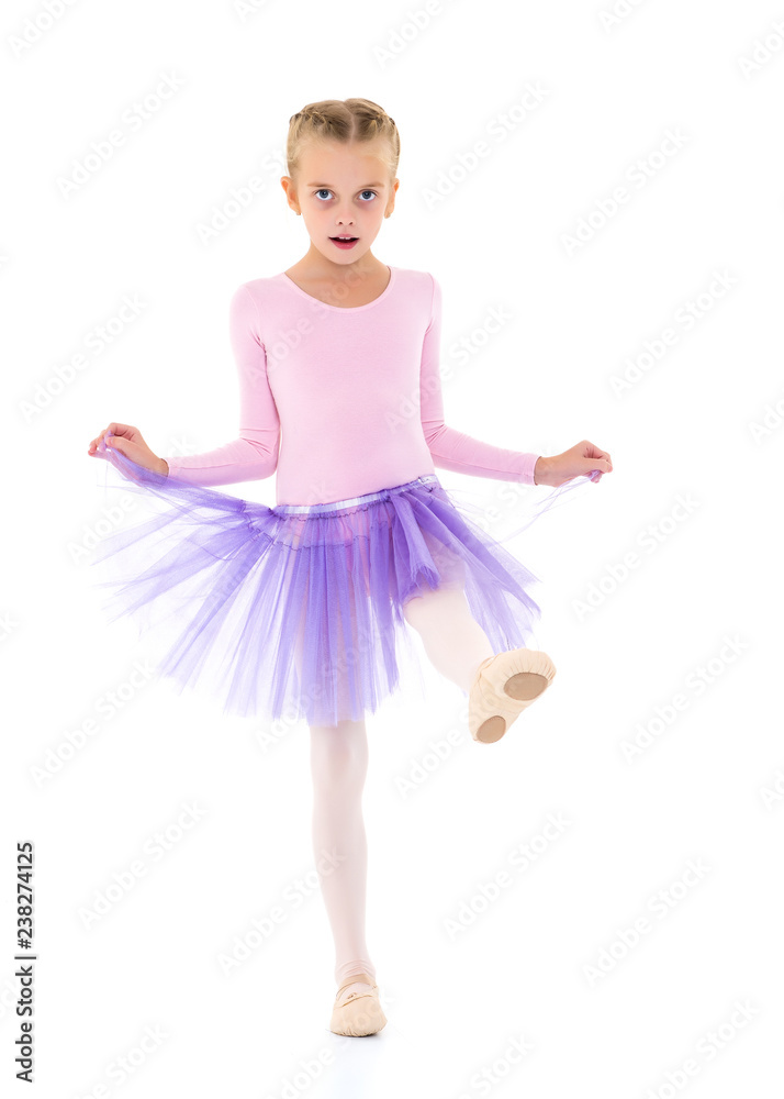 Little girl ballerina performs dance. Little girl ballerina performs dance.