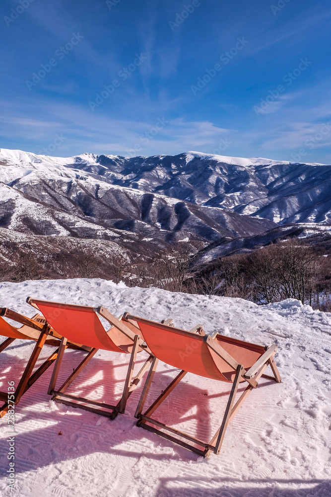 chairs on mountain top. skiing