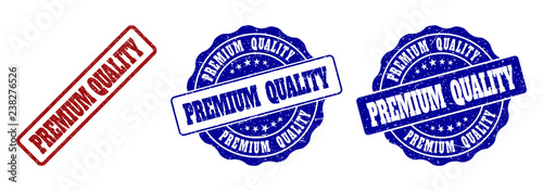 PREMIUM QUALITY grunge stamp seals in red and blue colors. Vector PREMIUM QUALITY overlays with grunge surface. Graphic elements are rounded rectangles, rosettes, circles and text tags.
