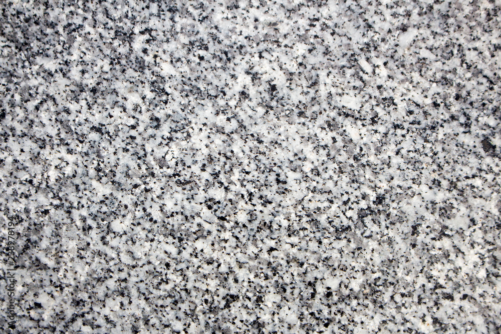Granite stone background. Black, gray and white colored granite texture. Granite stone background. Black, gray and white colored granite texture.