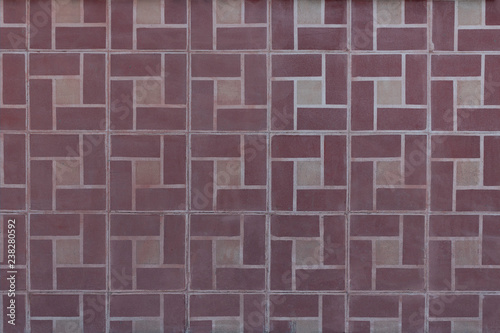 pared de viejos mosaicos de terrazo rosa con blanco