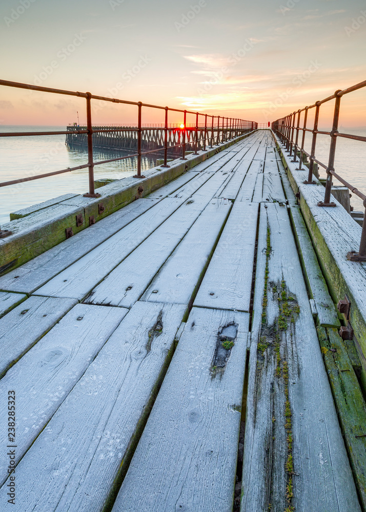 Frosty morning at South Pier, Blyth Harbour, Northumberland, England, UK.