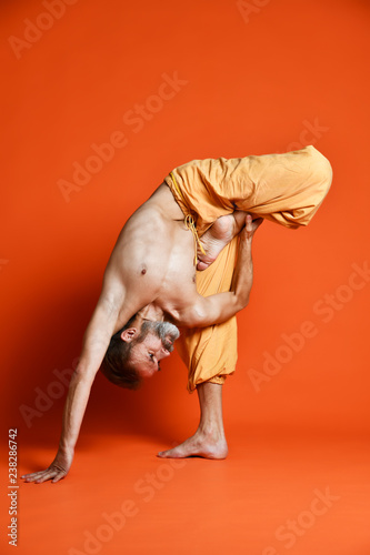 Man practicing advanced yoga. A series of yoga poses.
