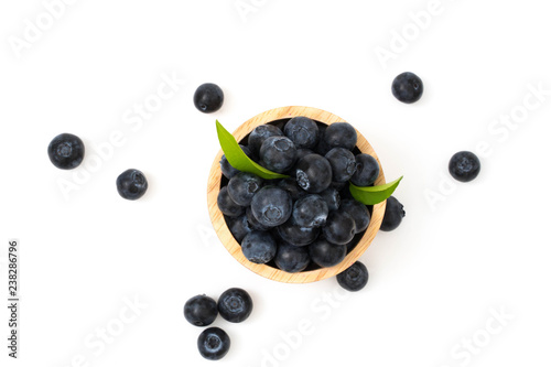 blueberries on bow isolated on white background