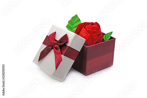 Valentine’s gift: Origami red rose in gift box. D.I.Y. concepts (Do it yourself) and Hobbies concepts, Isolated on white background.