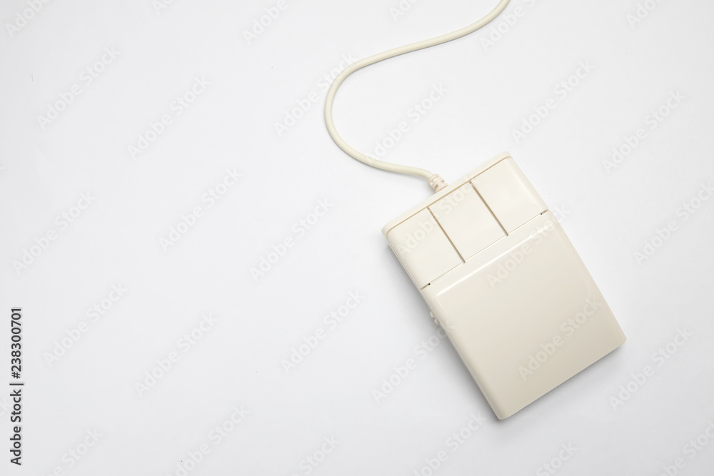 Retro white three-button computer mouse on a white background with copy  space. Top view of an old-fashioned input device without scroll wheel.  Stock Photo | Adobe Stock