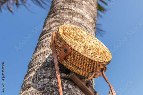 Nude natural organic handmade rattan handbag closeup. photo