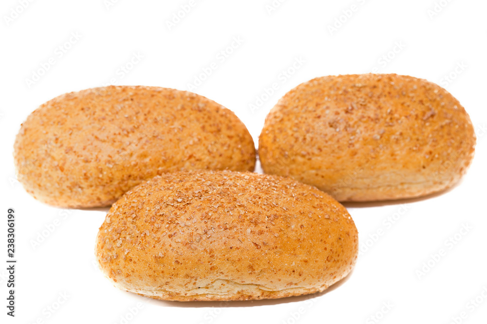 three dietary buns on a white background. bun of wholegrain three dietary buns on a white background. bun of wholegrain