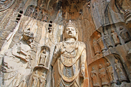 Longmen Grottoes : The Bodhisattava sculptures of Fengxian Cave (or Li Zhi Cave) The world heritage site, Chinese Buddhist art. Located in Louyang, Henan province China. Selective focus. photo