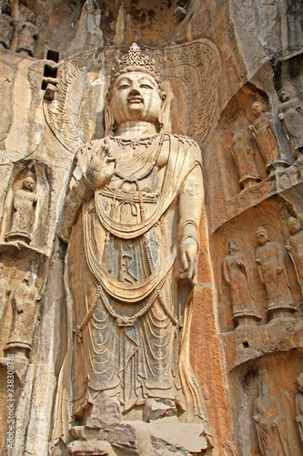 Longmen Grottoes : The Bodhisattava sculptures of Fengxian Cave (or Li Zhi Cave) The world heritage site, Chinese Buddhist art. Located in Louyang, Henan province China. Selective focus.