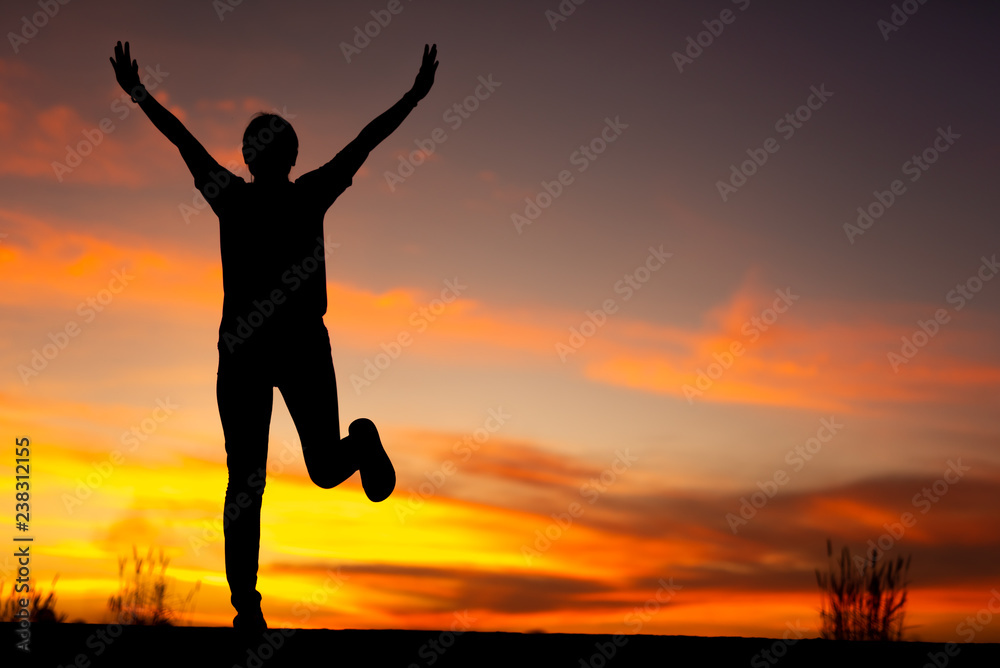 Young woman relaxing in winter sunset sky outdoor. Young woman relaxing in winter sunset sky outdoor.