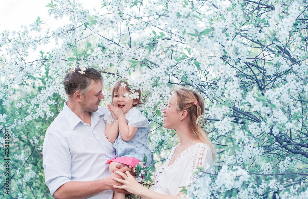 happy family on spring garden happy family on spring garden