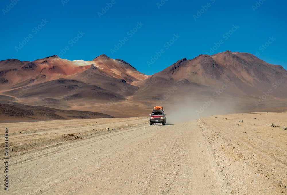 Car riding in Bolivian sunshine landscape Car riding in Bolivian sunshine landscape