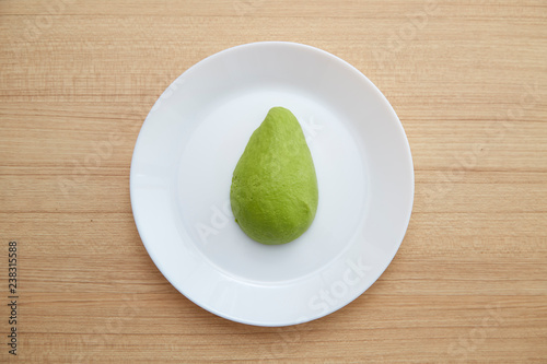 Avocado on white plate Healthy