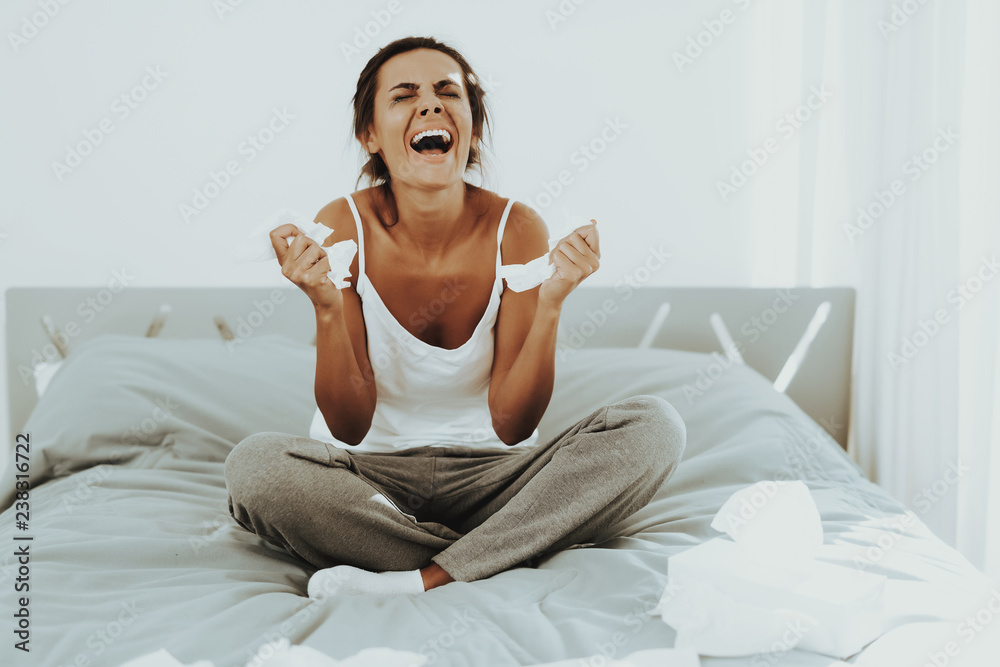 Sad Woman With Flowed Mascara Crying On The Bed. Sad Woman With Flowed Mascara Crying On The Bed.