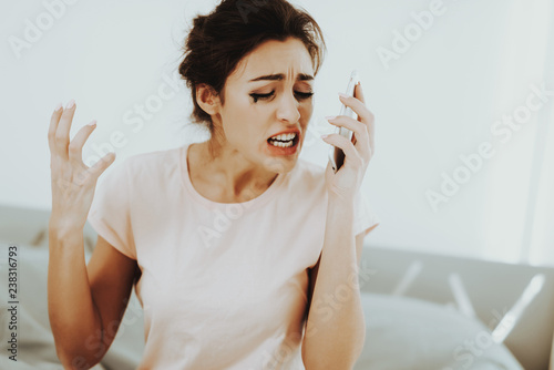 Crying Lonely Woman Phone Call. Bedroom Concept.