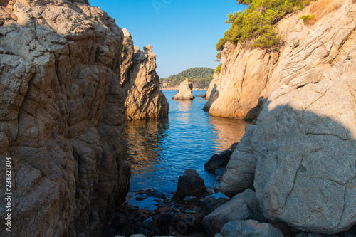 Bay in mediterranean, Spain. Cliff on sea beach in Lloret de Mar © dzmitrock87