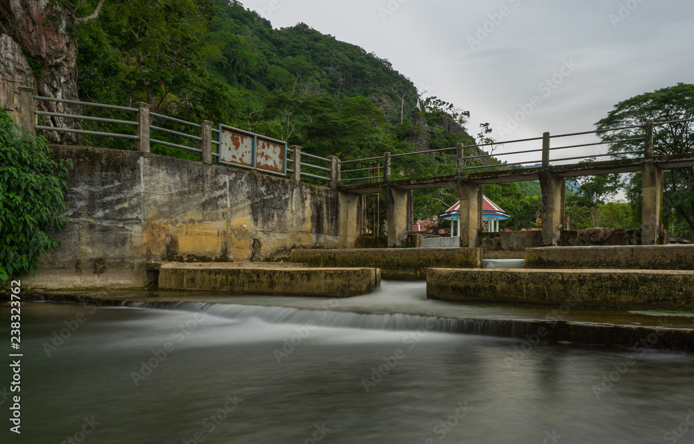Water flowing from the dam, catchment area in countryside Thailand