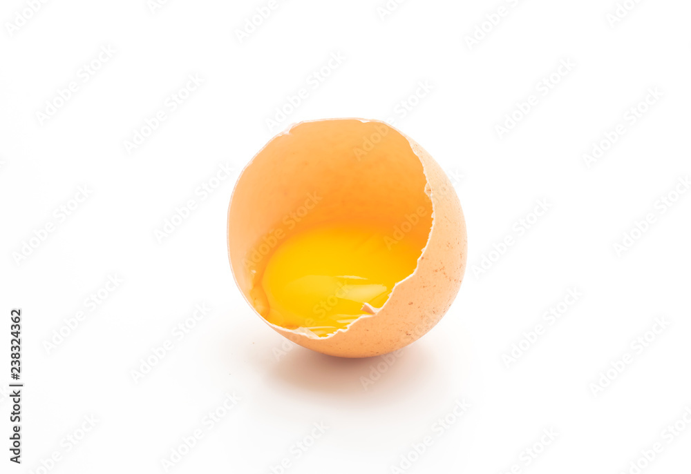 Cracked egg and shell on a white background Cracked egg and shell on a white background