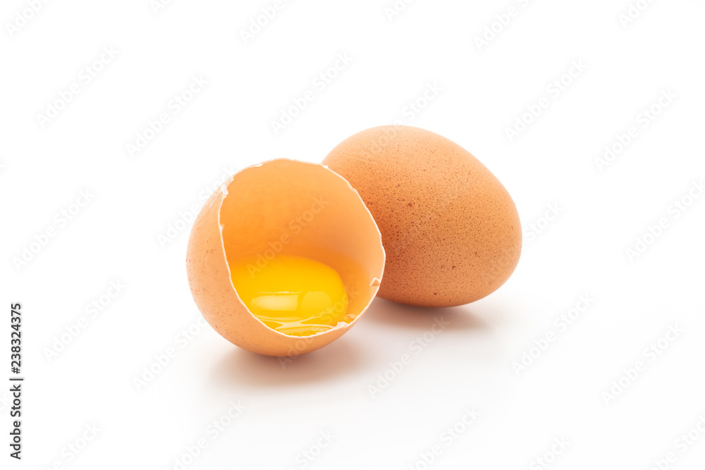 Cracked egg and shell on a white background Cracked egg and shell on a white background