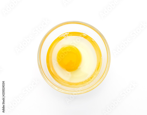 Cracked egg and shell on a white background © topntp