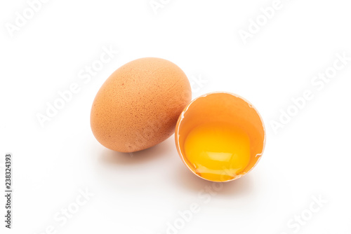 Cracked egg and shell on a white background