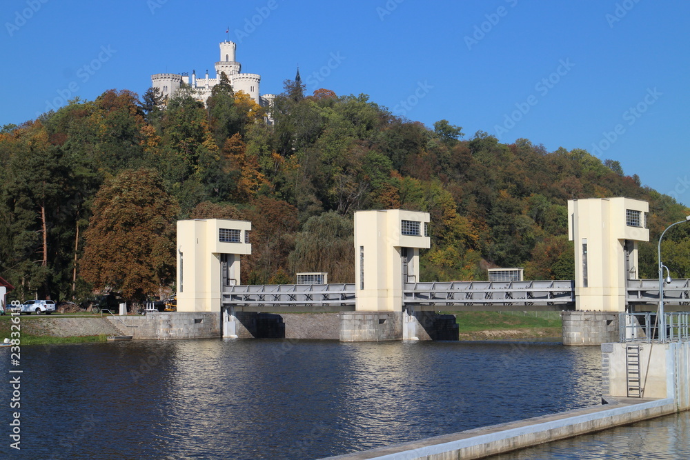 Lock (water navigation) on Vltava river and Hluboká castle, Czech republic 