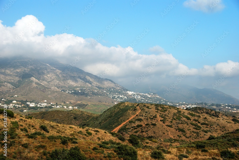 View across countryside towards the Sierra de Mijas mounmtains near Fuengirola, Spain.