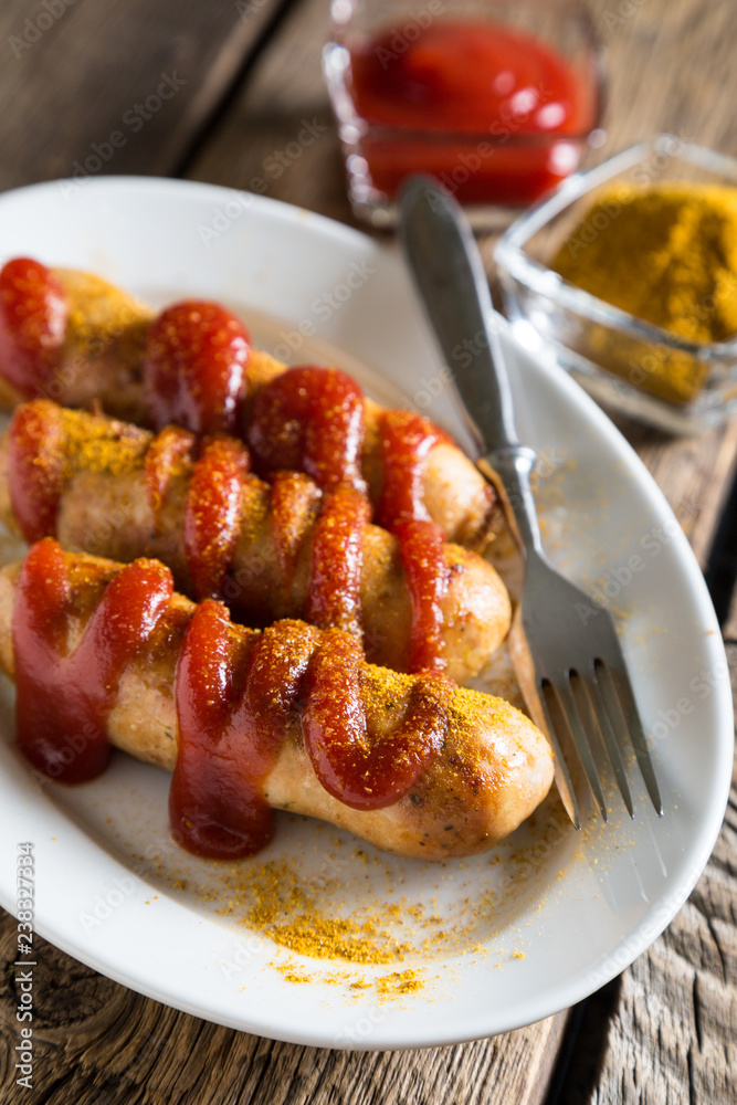 Curry wurst. German sausages with ketchup and curry