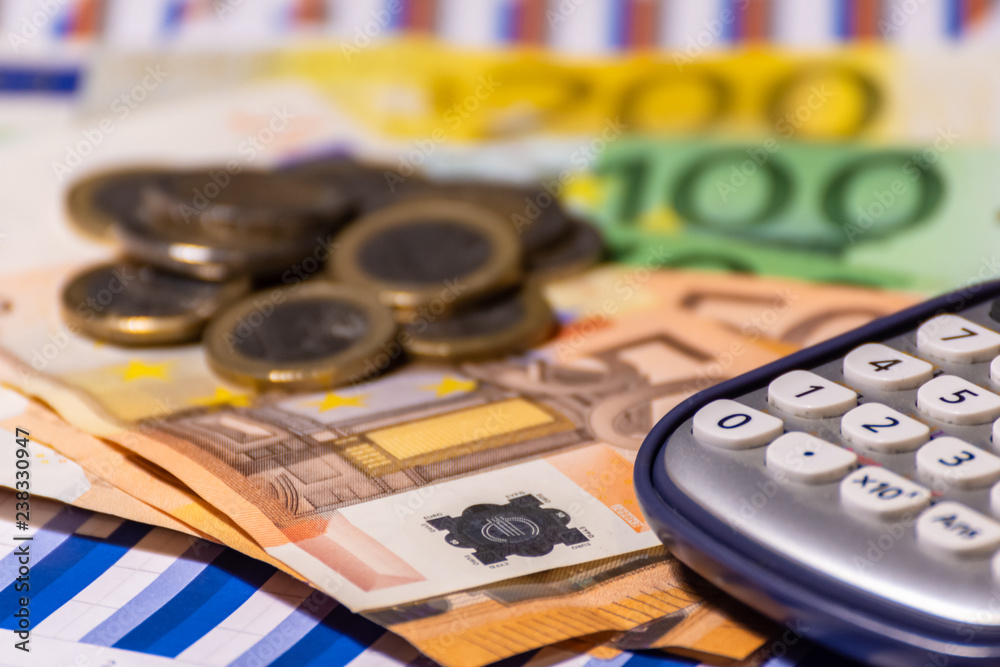pen, calculator , money , graph for finance and business concept pen, calculator , money , graph for finance and business concept