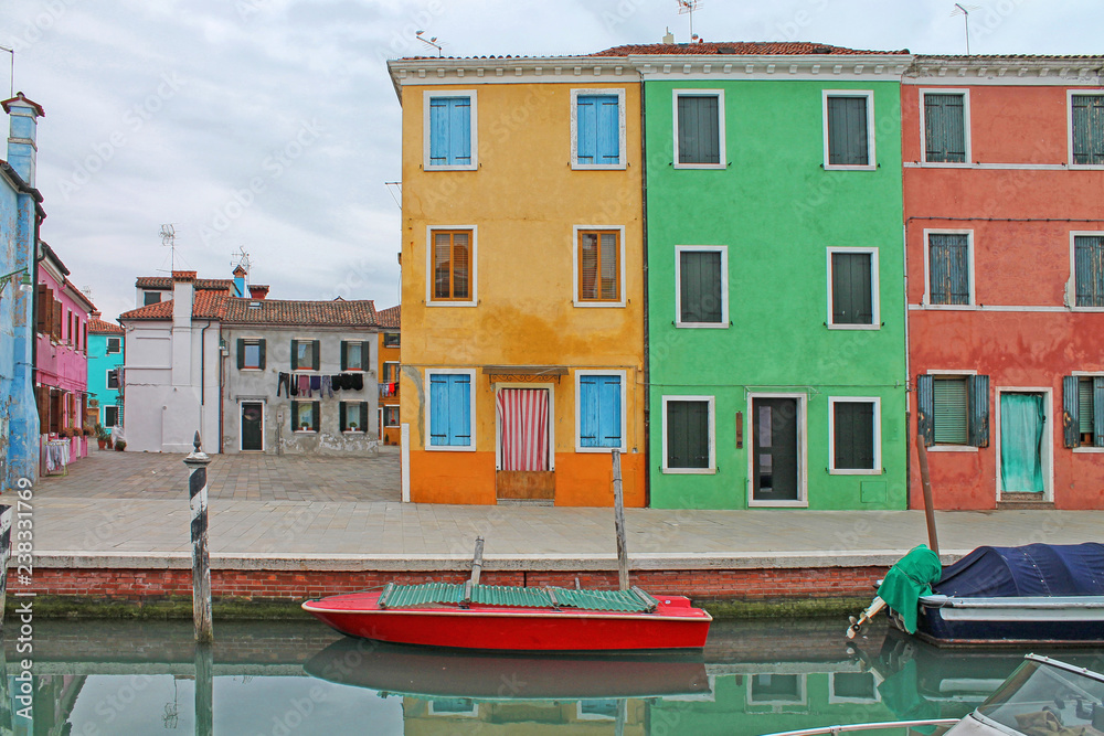 Colorful buildings in Burano island. Architecture of Burano island near Venice, Italy, Europe.