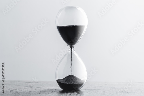Close up hourglass on table