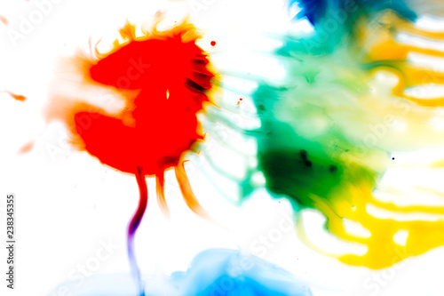 multicolored watercolor streaks and stains. background for design