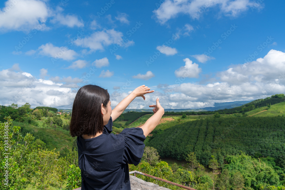 Happy young cute asian girl hipster backpack women travelling looking at beautiful sky mountains scenery views Happy young cute asian girl hipster backpack women travelling looking at beautiful sky mountains scenery views