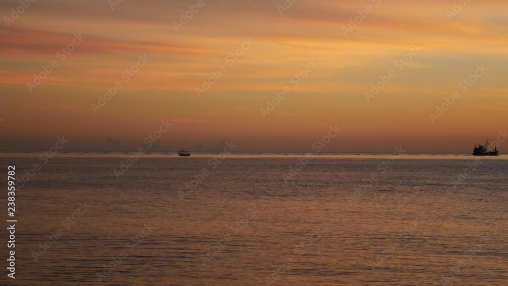 Sunrise, sea and fishing boat Sunrise, sea and fishing boat