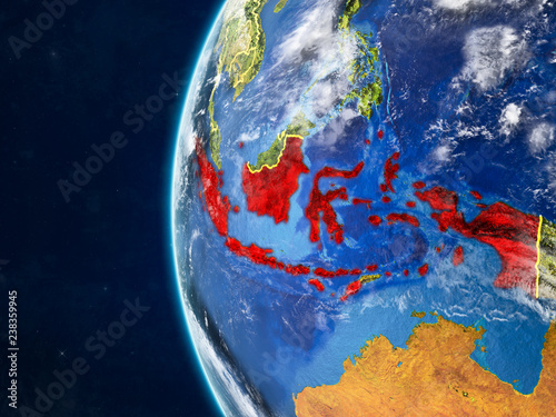 Indonesia from space on model of planet Earth with country borders and very detailed planet surface and clouds.