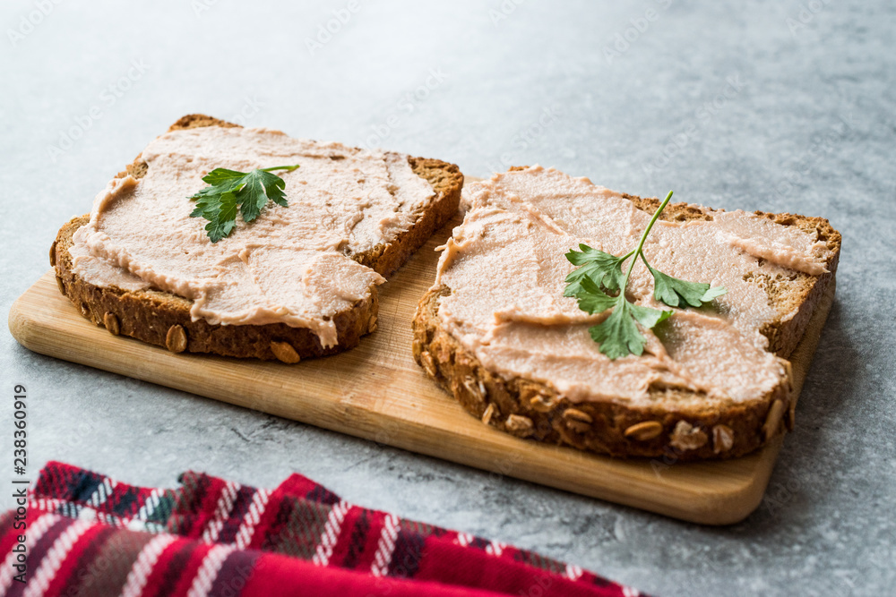 Tuna Cream Paste with Toast Bread on Wooden Board / Creamed Fish Pate.