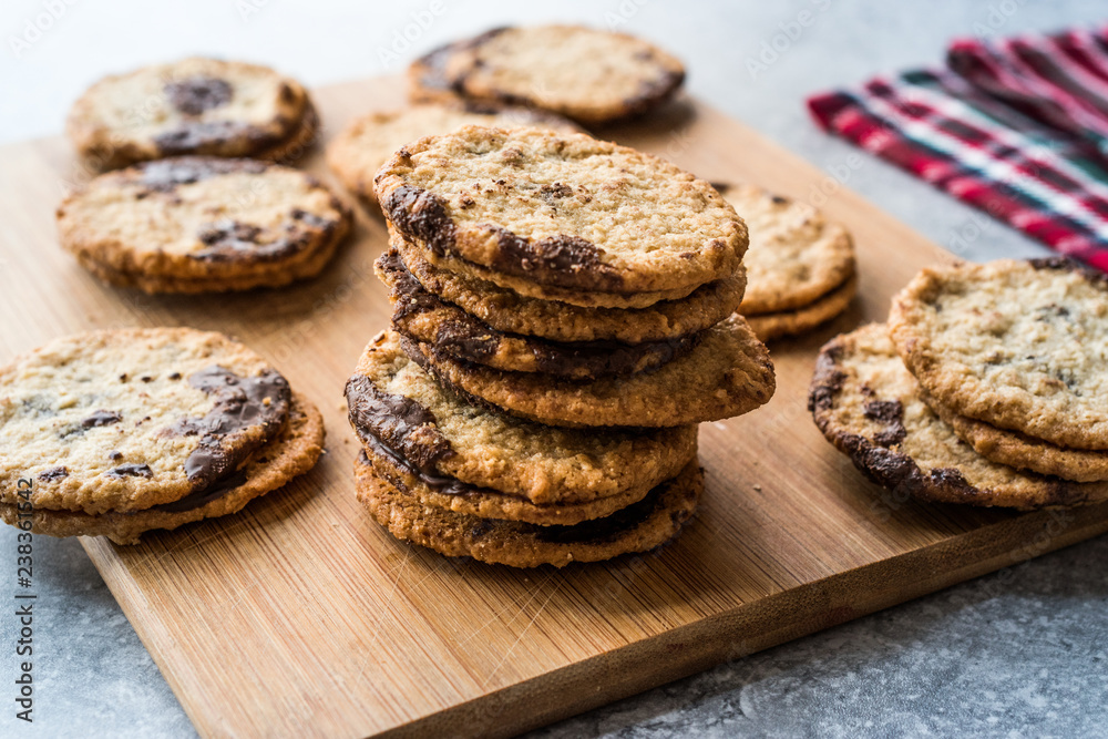 Classic Swedish Oatmeal Cookies with Chocolate on Wooden Board. Classic Swedish Oatmeal Cookies with Chocolate on Wooden Board.